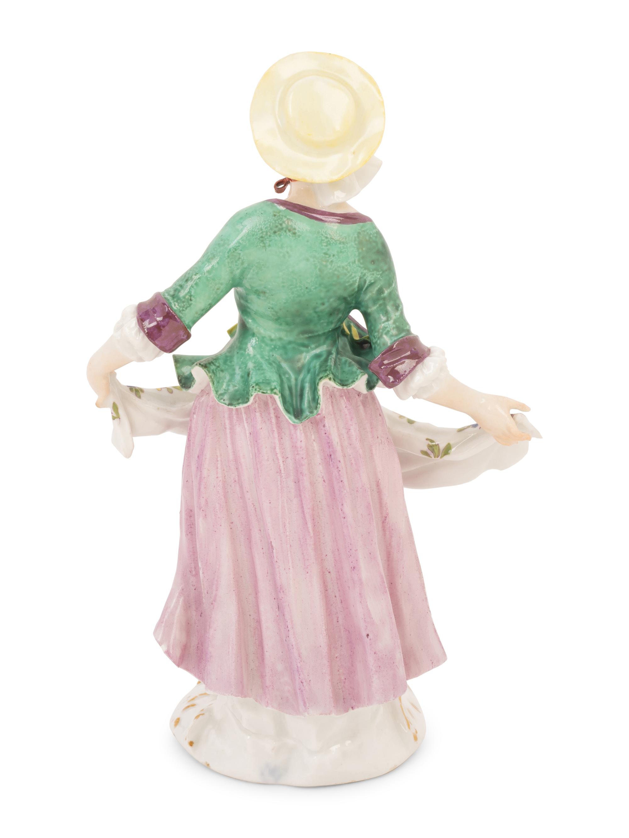 A Meissen Porcelain Figure of a Maiden