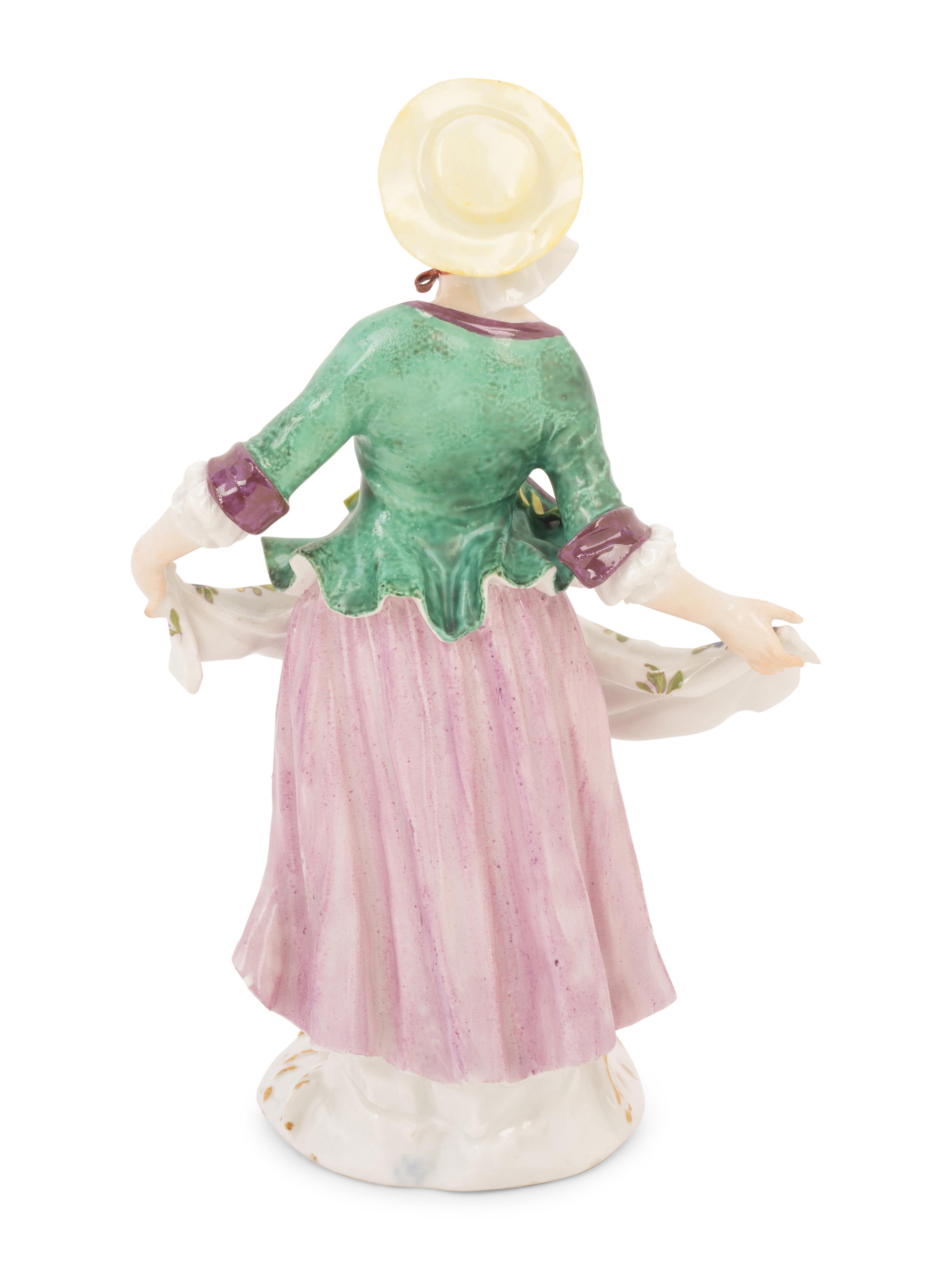 A Meissen Porcelain Figure of a Maiden