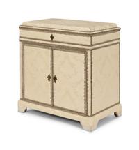 A Cream Damask-Upholstered And Painted Lift-Top Cabinet
