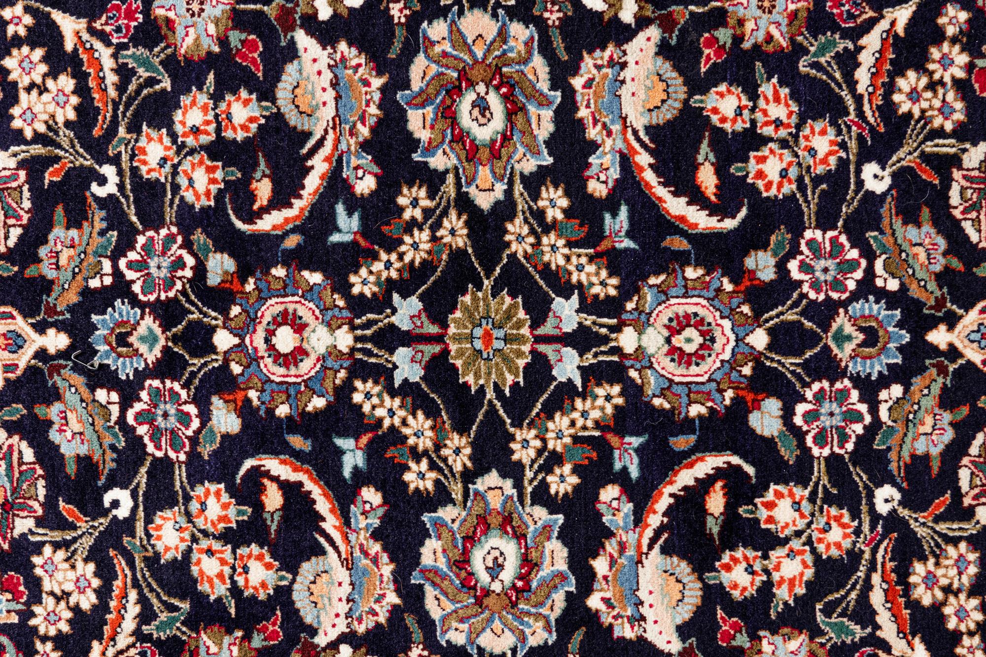 A Kashan Wool Rug