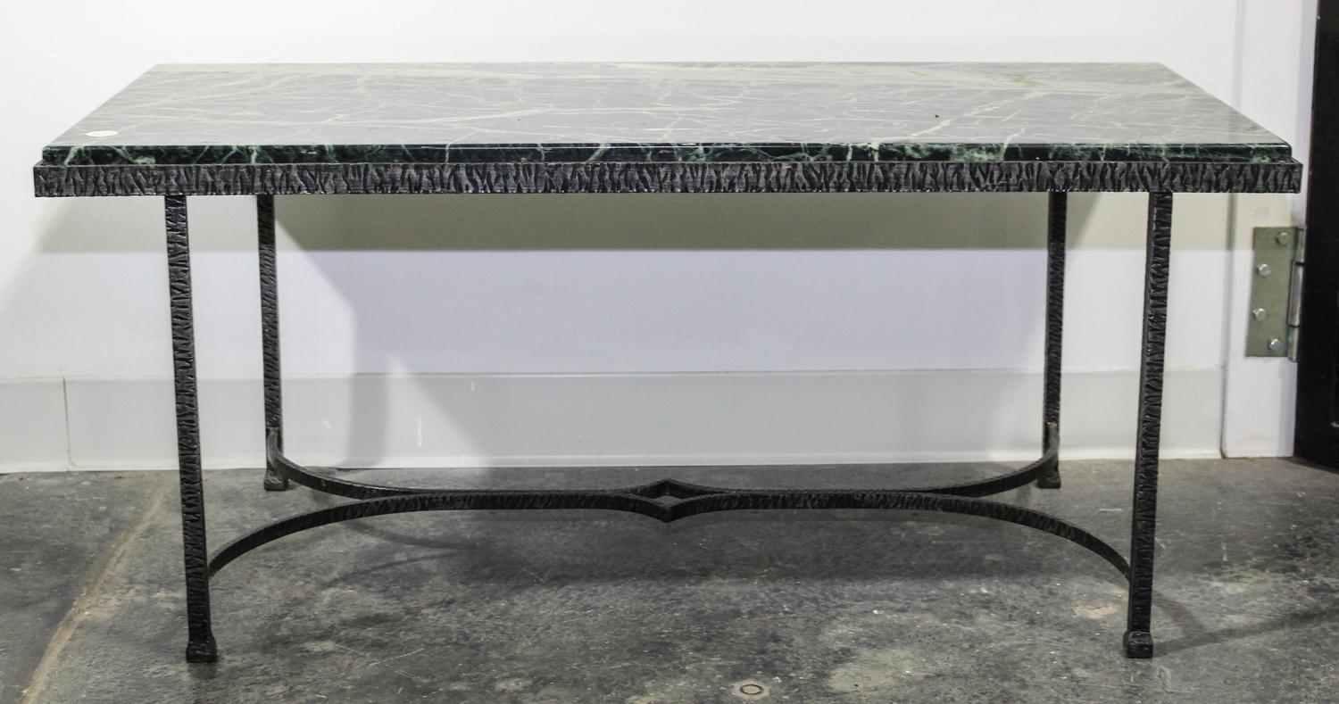 An Art Deco Style Iron and Marble Low Table. Height 17 1/2 x width 39 1/2 x depth 18 inches.