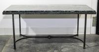 An Art Deco Style Iron and Marble Low Table. Height 17 1/2 x width 39 1/2 x depth 18 inches.