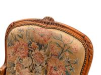 A Pair of Louis XV Style Beechwood Fauteuils