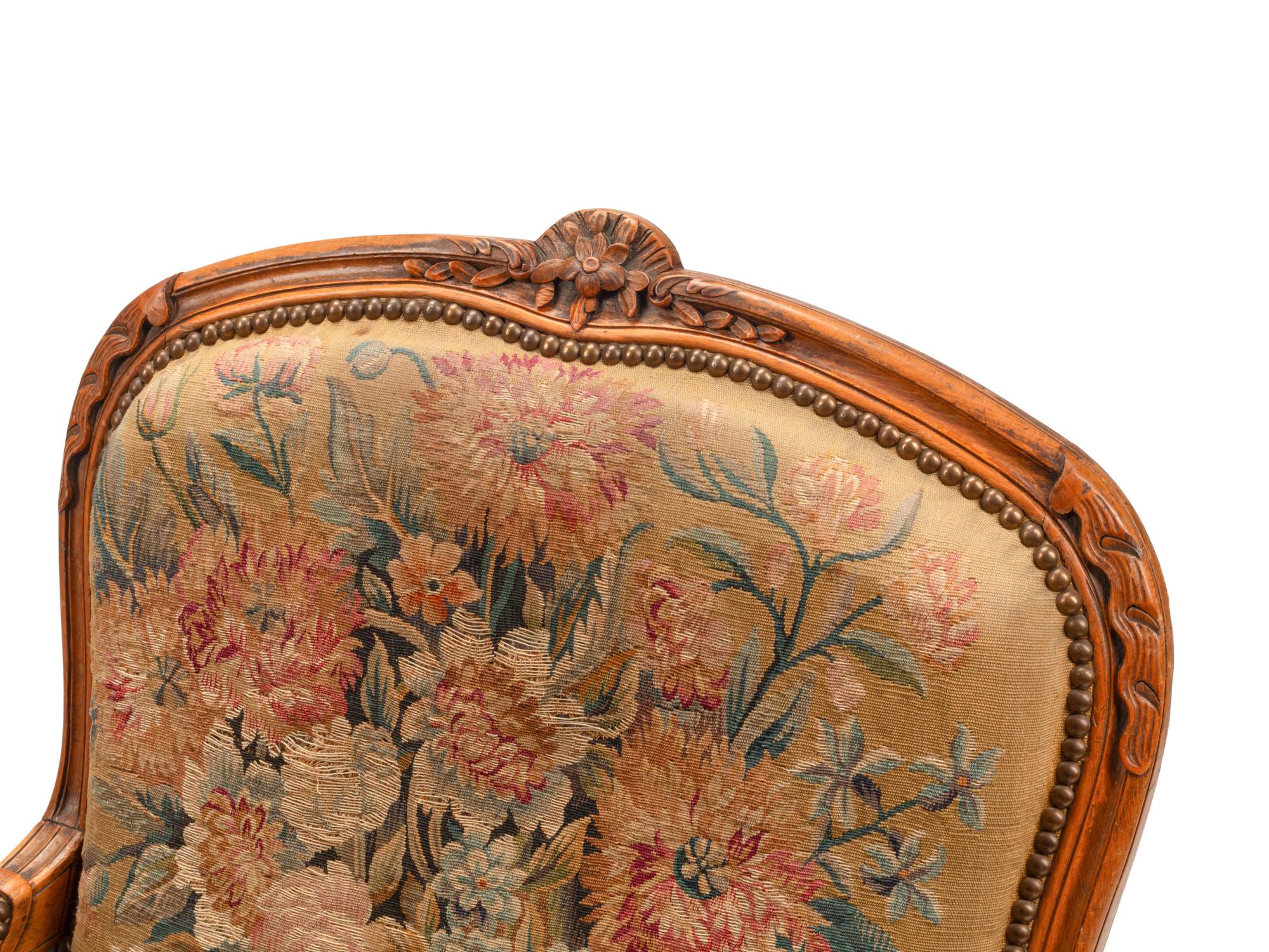 A Pair of Louis XV Style Beechwood Fauteuils