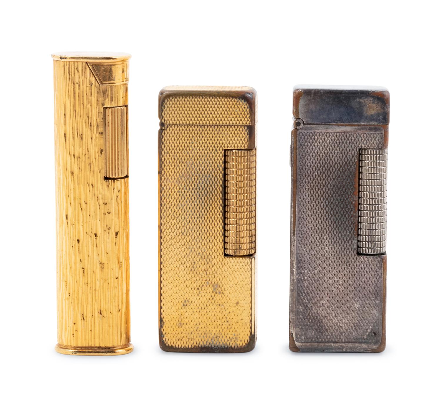 A Group of Three Dunhill Lighters