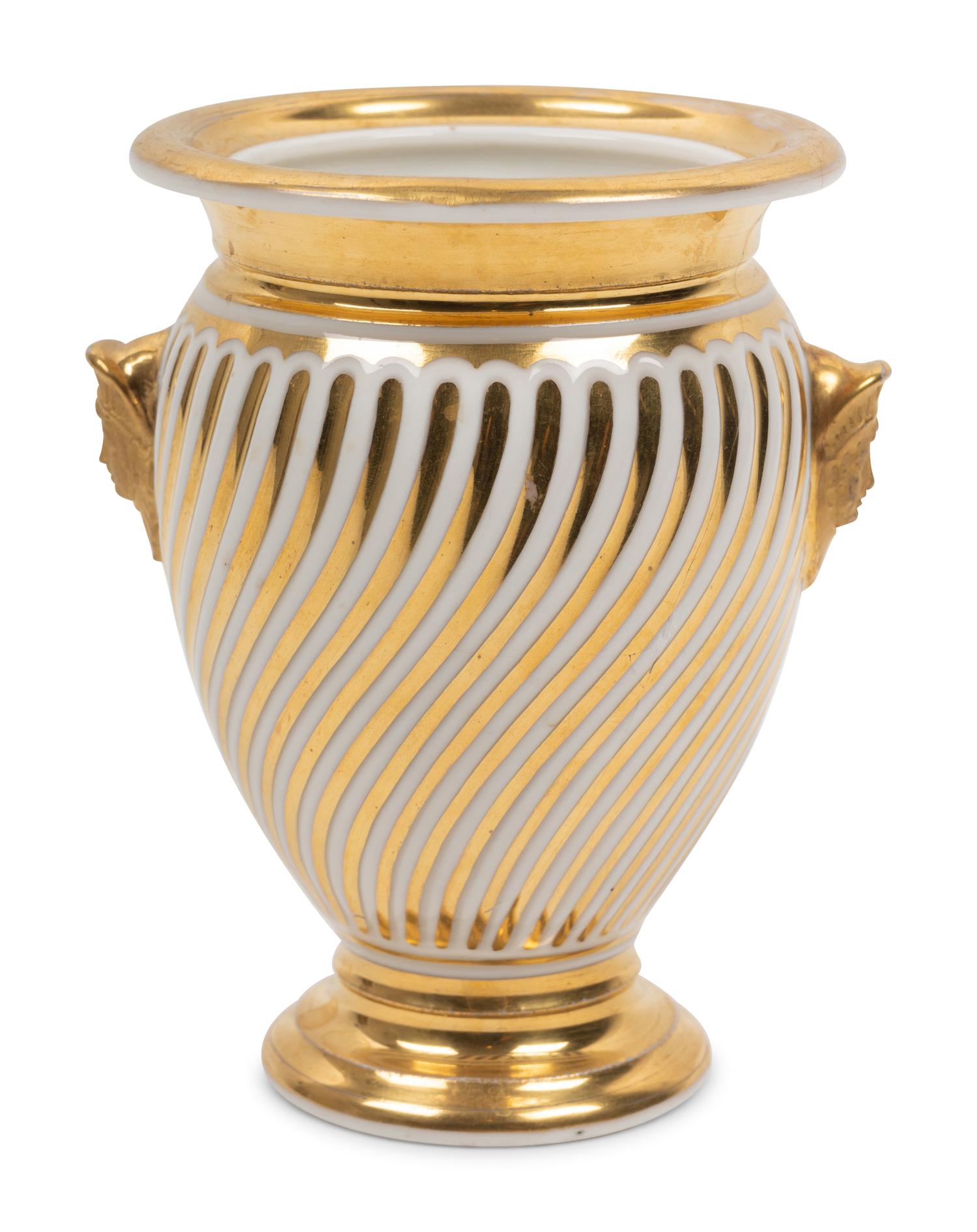 A Continental Parcel Gilt Porcelain Spiral Molded Vase