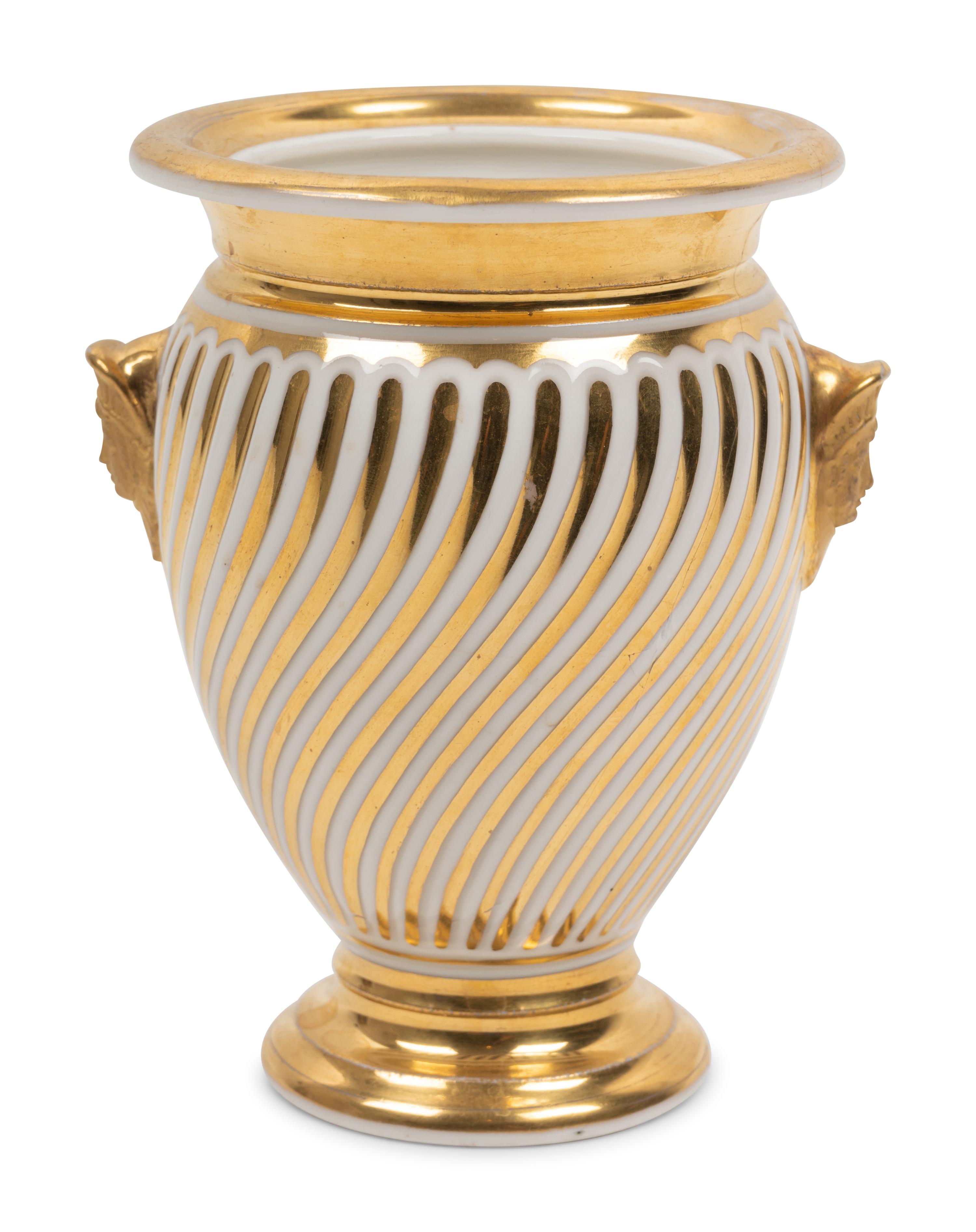 A Continental Parcel Gilt Porcelain Spiral Molded Vase