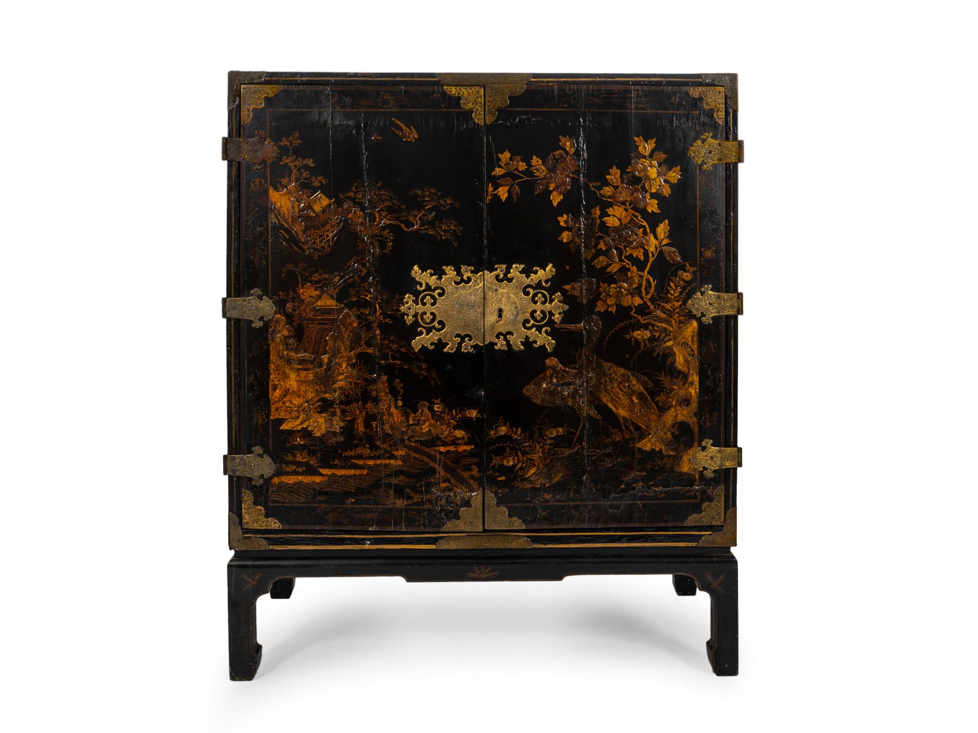 A William & Mary Black and Gilt Japanned Cabinet on Later Stand — 18TH CENTURY