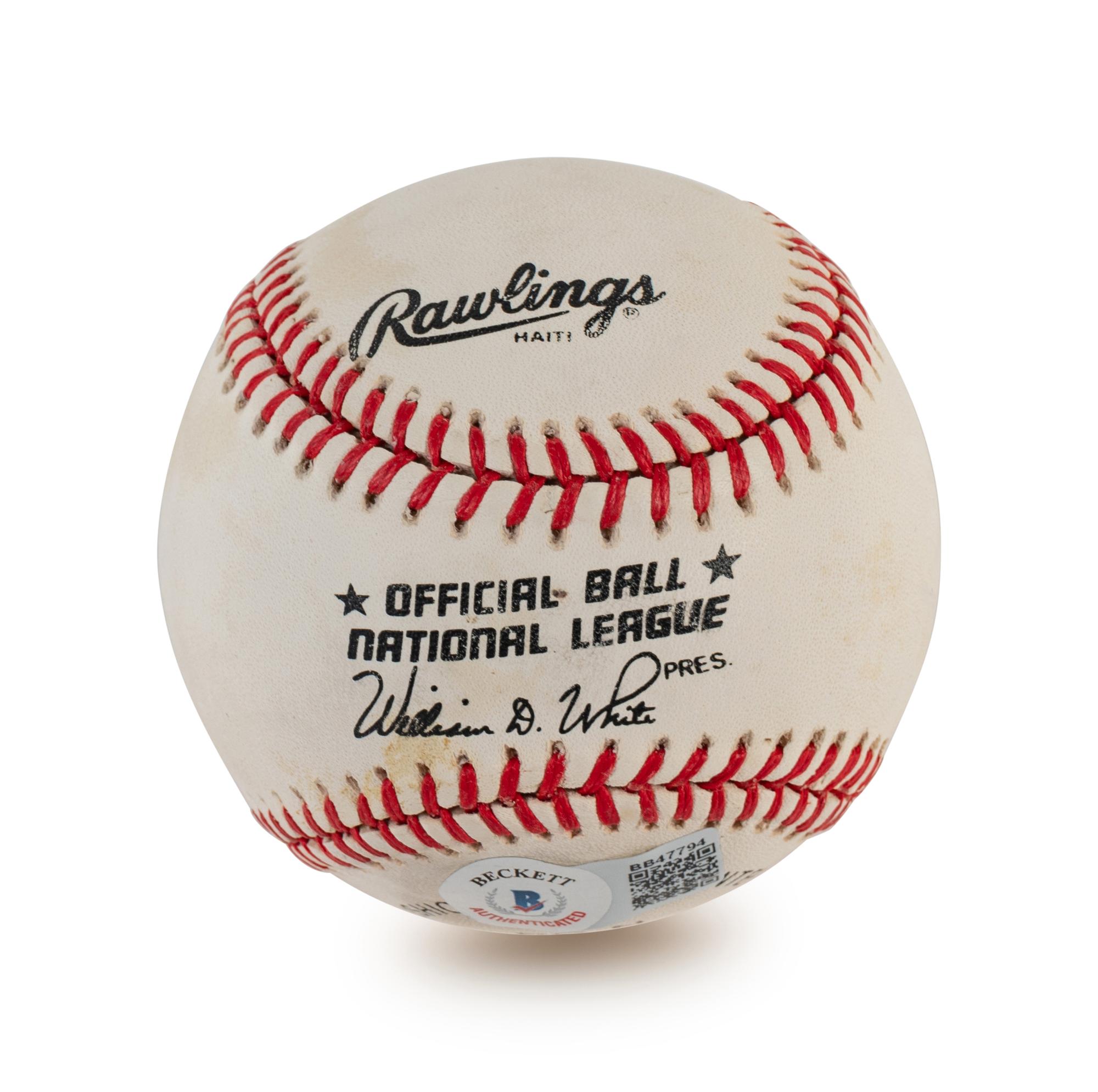 A Group of Four Milwaukee Braves Hall of Fame Signed Autograph Items Including Eddie Mathews and Warren Spahn (BAS Beckett Authentication Services Certified),