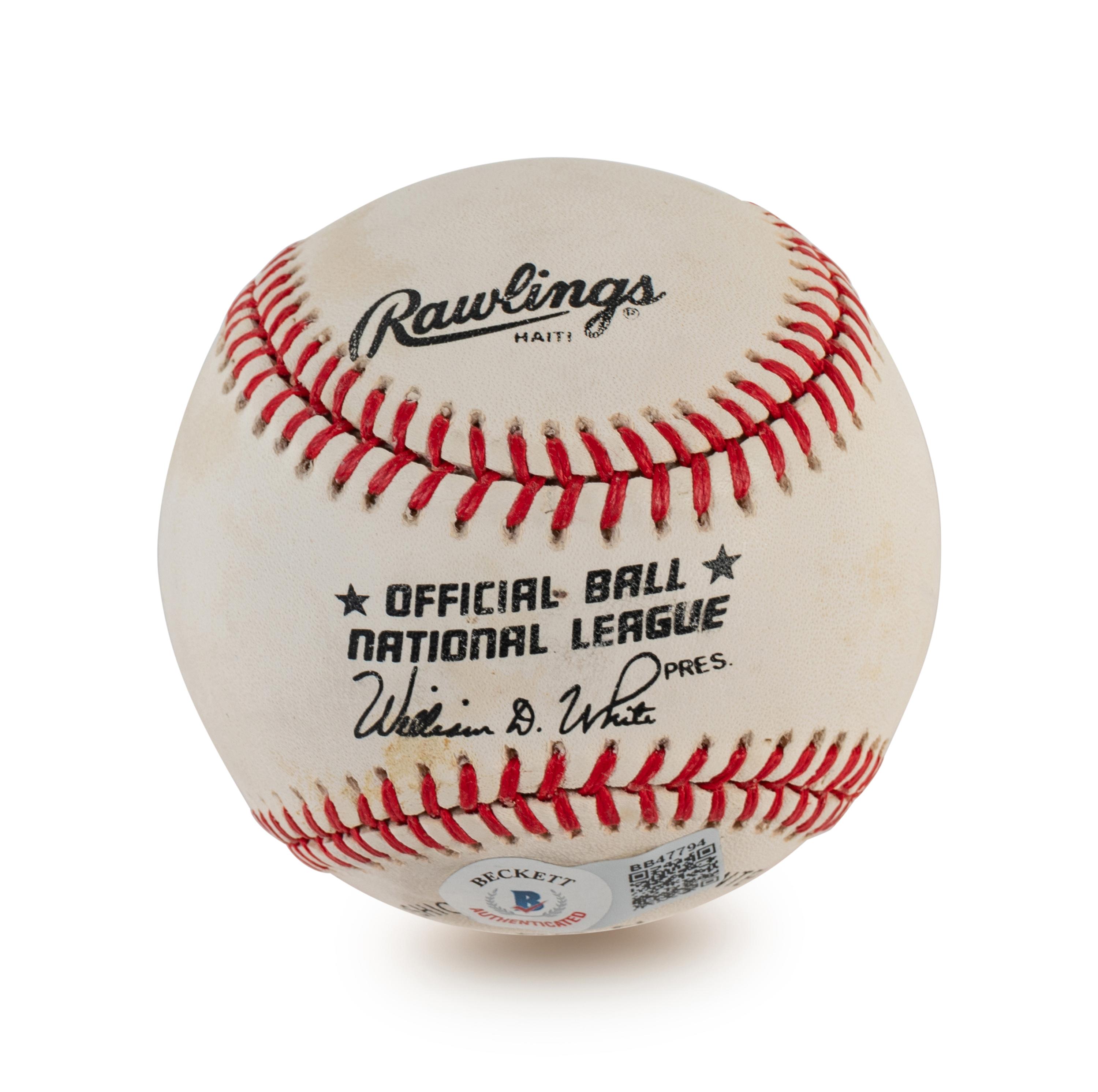 A Group of Four Milwaukee Braves Hall of Fame Signed Autograph Items Including Eddie Mathews and Warren Spahn (BAS Beckett Authentication Services Certified),