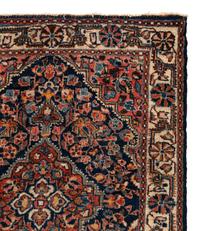 A Group of Three Wool Rugs