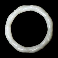 A Pale Celadon Jade 'Bamboo' Bangle