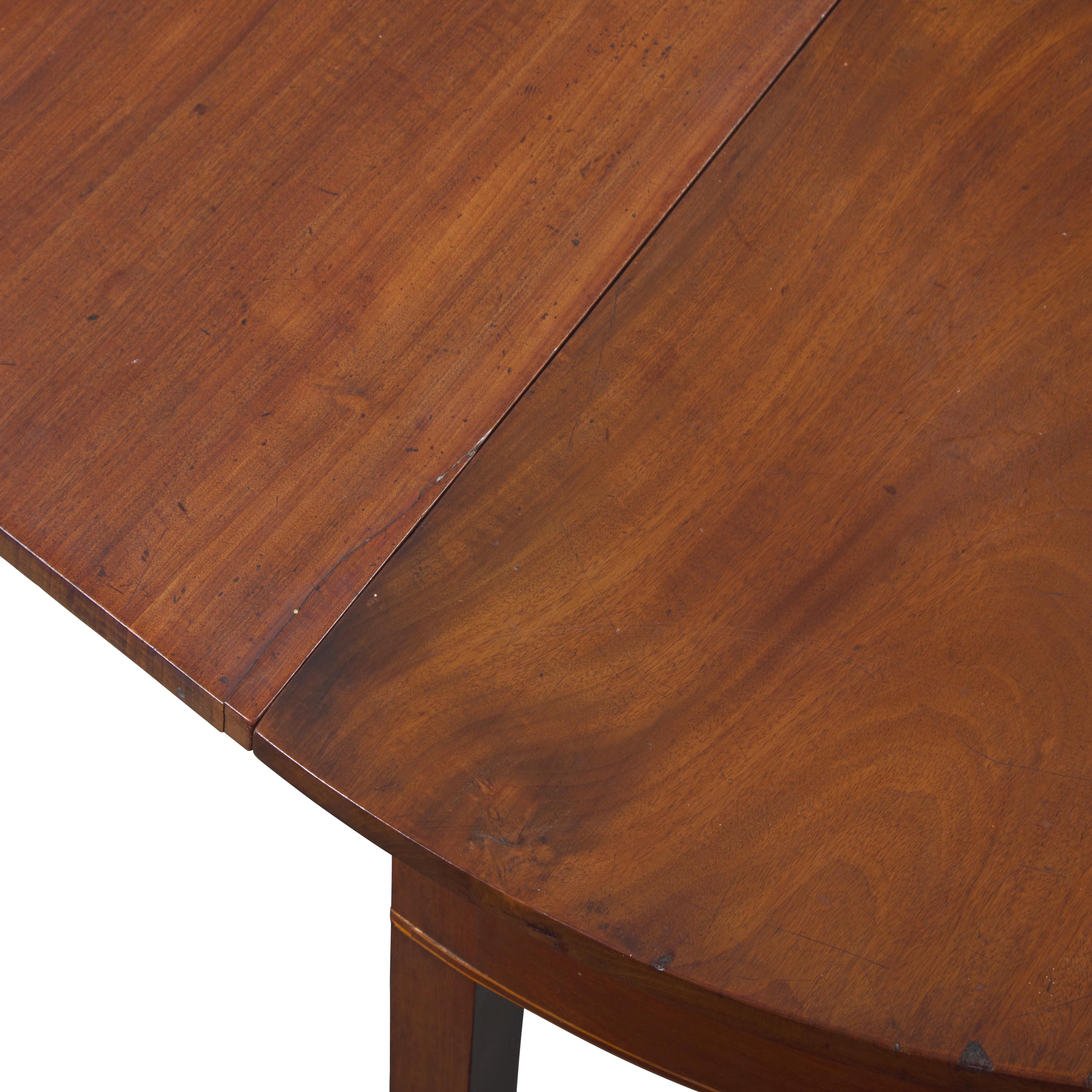 A George III Mahogany Three-Part Dining Table