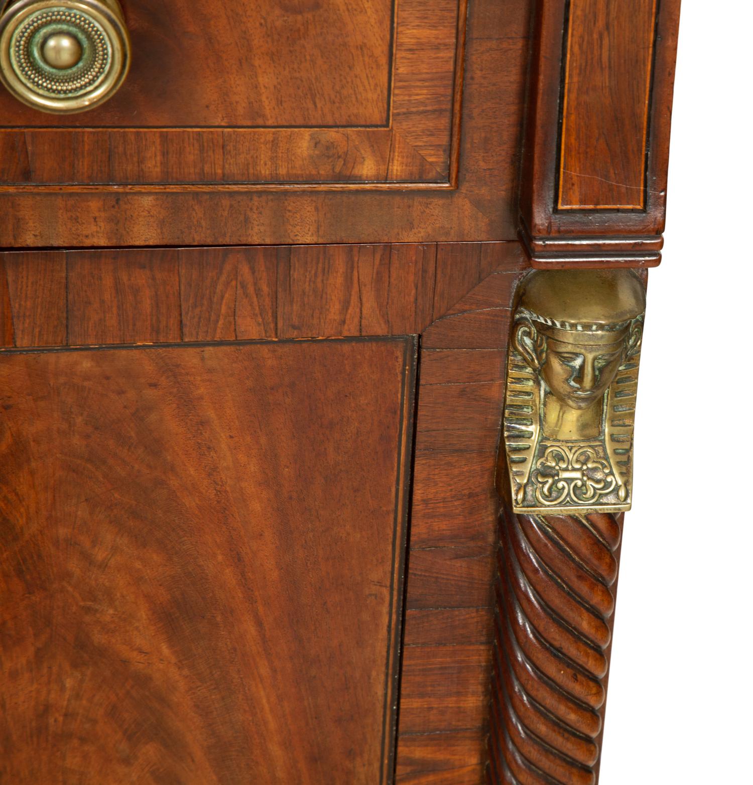 A Regency Gilt Bronze Mounted Mahogany Two-Pedestal Sideboard