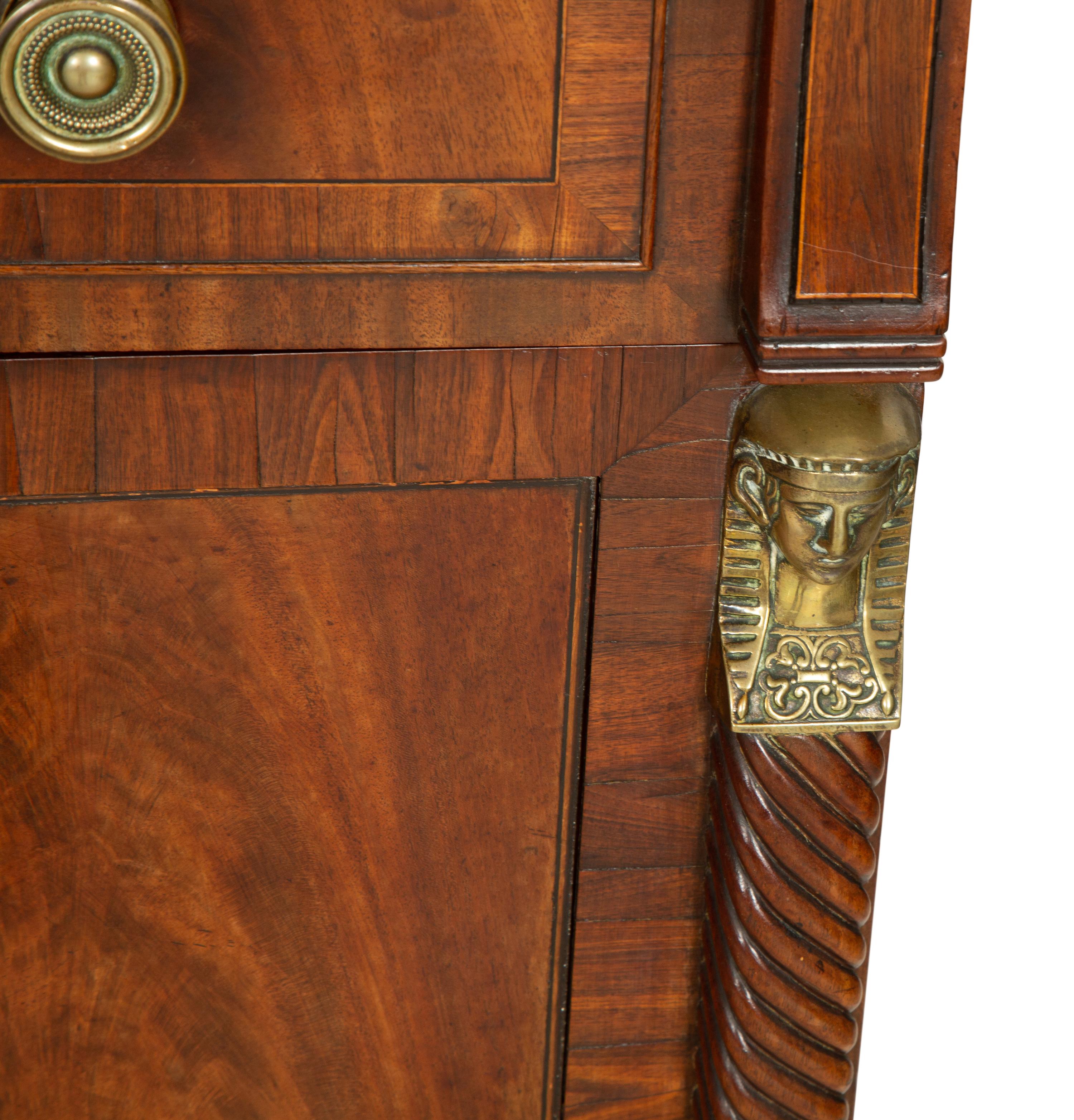 A Regency Gilt Bronze Mounted Mahogany Two-Pedestal Sideboard