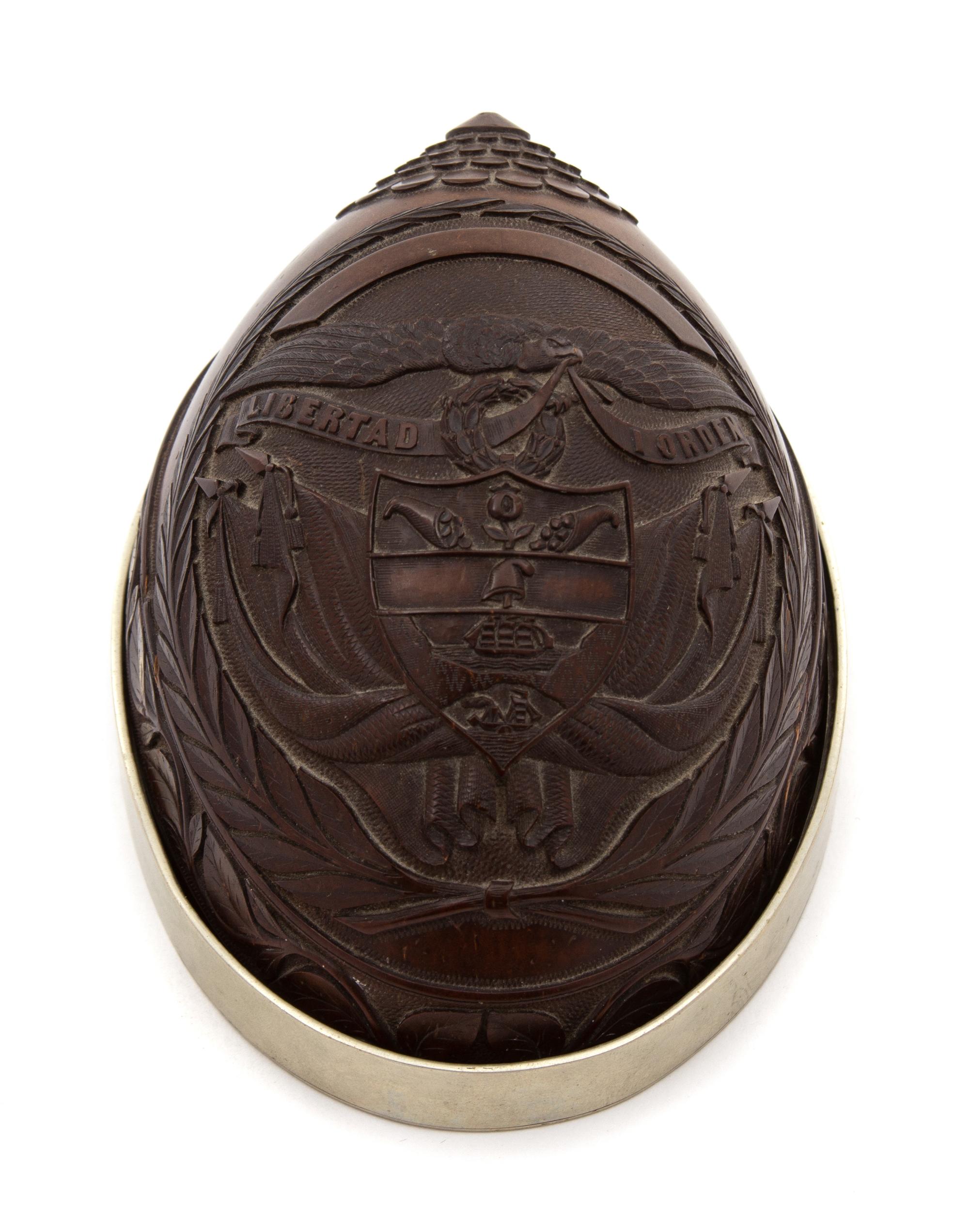 A Portuguese Carved Coconut Shell on Silver Plate Base — 19TH CENTURY