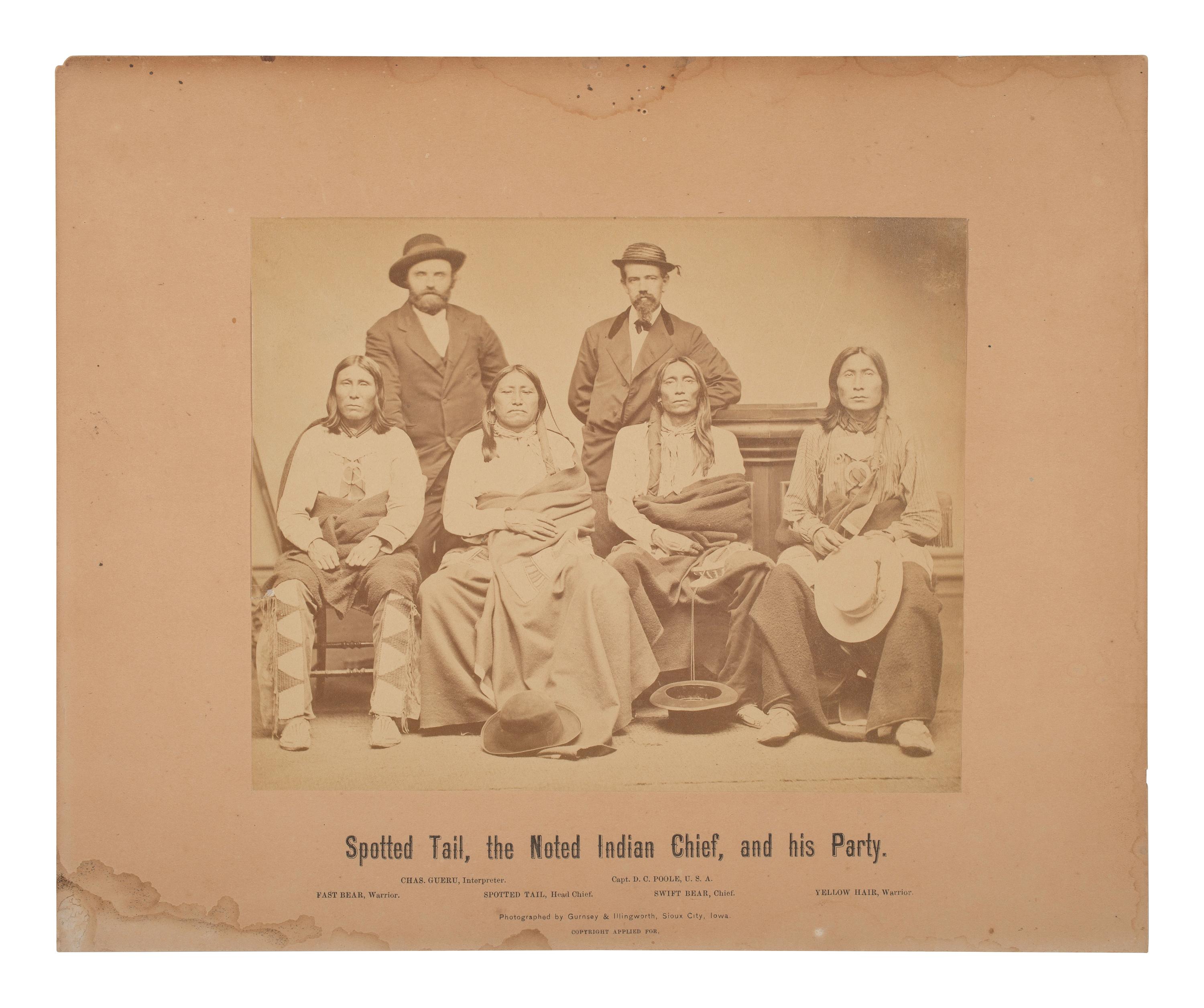 GURSNEY & ILLINGWORTH, photographers. Spotted Tail, the Noted Indian Chief, and his Party . Sioux City, Iowa, [ca June 1870].