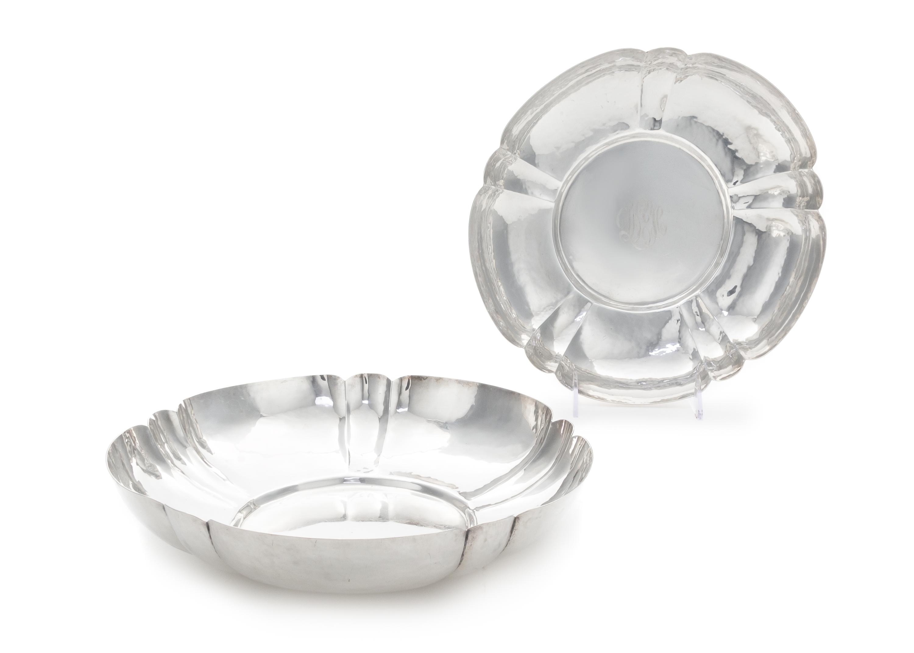 A Pair of American Silver Bowls, Cellini Craft, Ltd., Chicago, IL, 1920, each of circular form having lobed sides and a lightly spot-ha