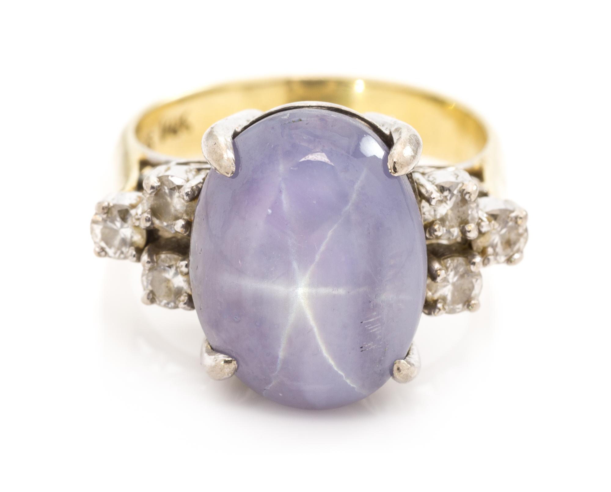 A 14 Karat Bicolor Gold, Star Sapphire and Diamond Ring, 5.20 dwts.