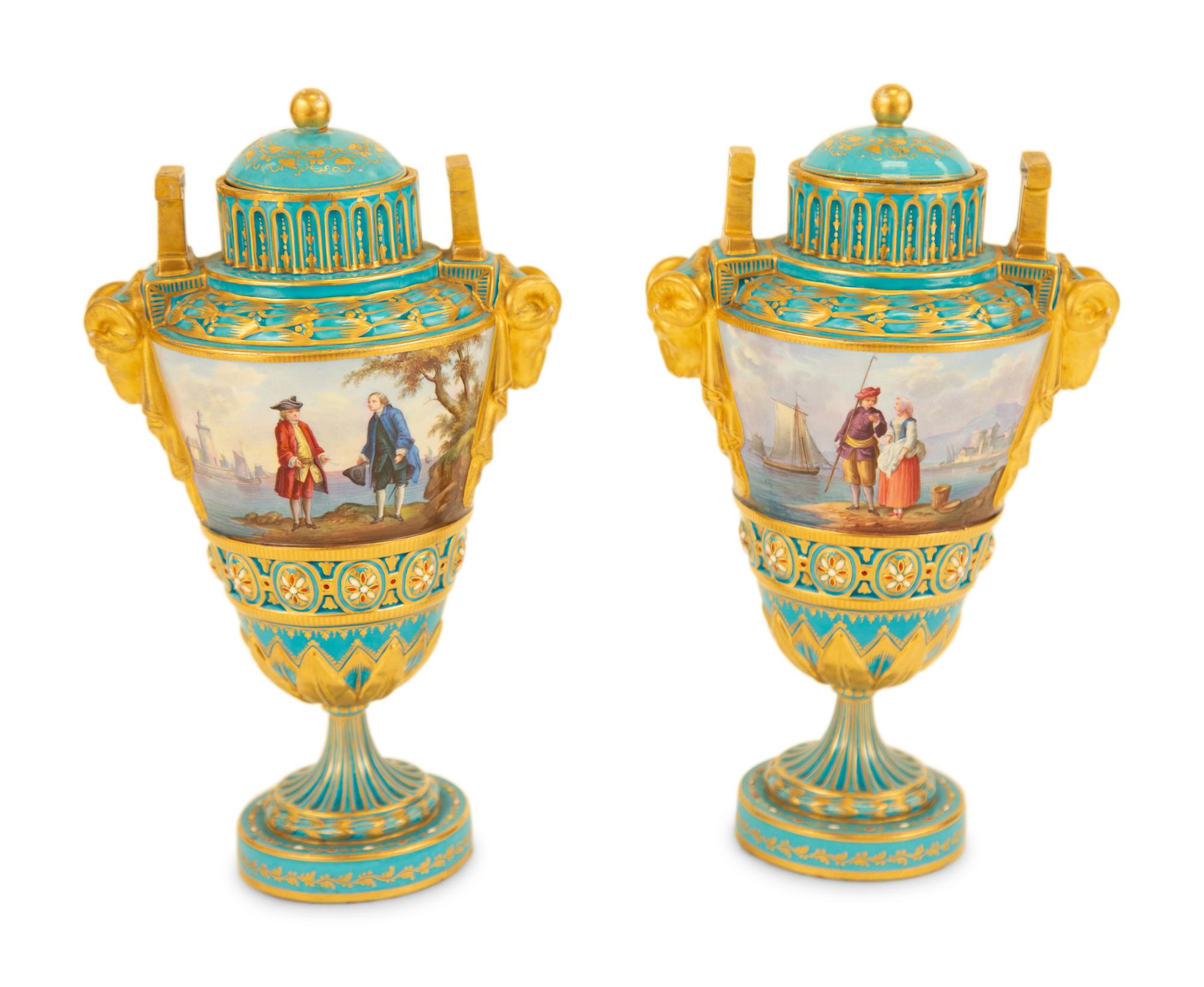 A Pair of Sèvres Style Porcelain Urns and Covers