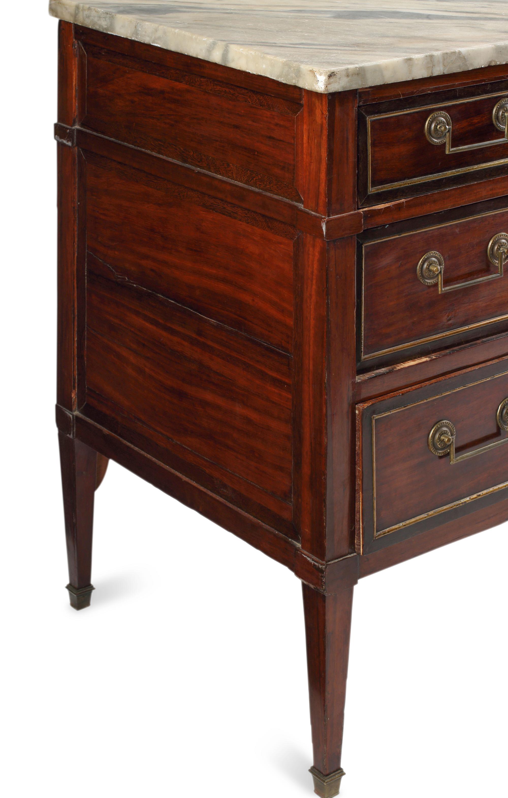 A Louis XVI Mahogany and Marble-Top Commode