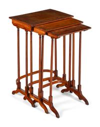 A Set of Three Edwardian Satinwood Nesting Tables