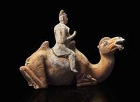 A Chinese painted pottery figure of a camel and rider, Tang dynasty 彩陶駱駝人俑 唐