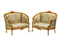 A Pair of Louis XV Style Giltwood Sofas