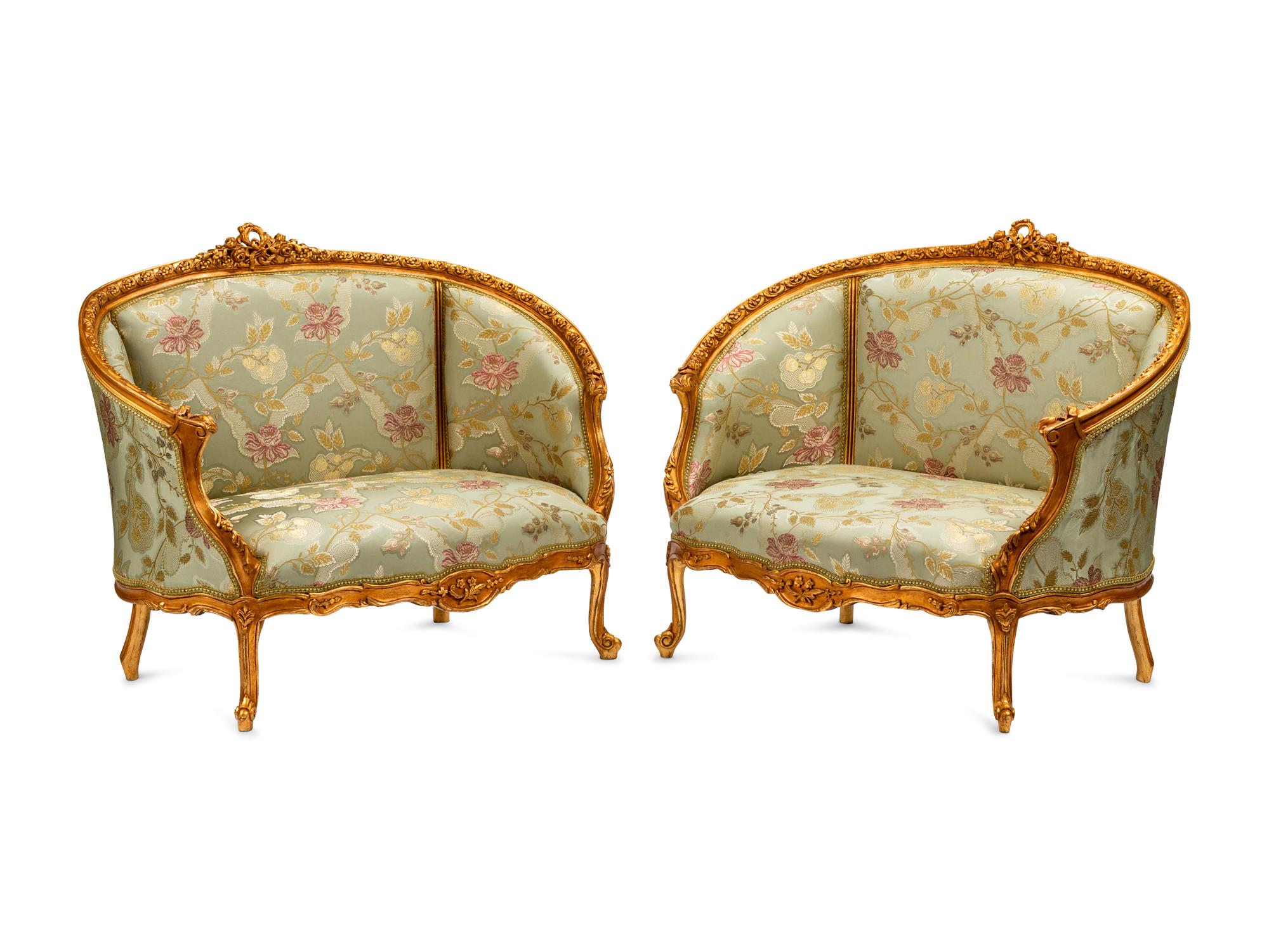 A Pair of Louis XV Style Giltwood Sofas