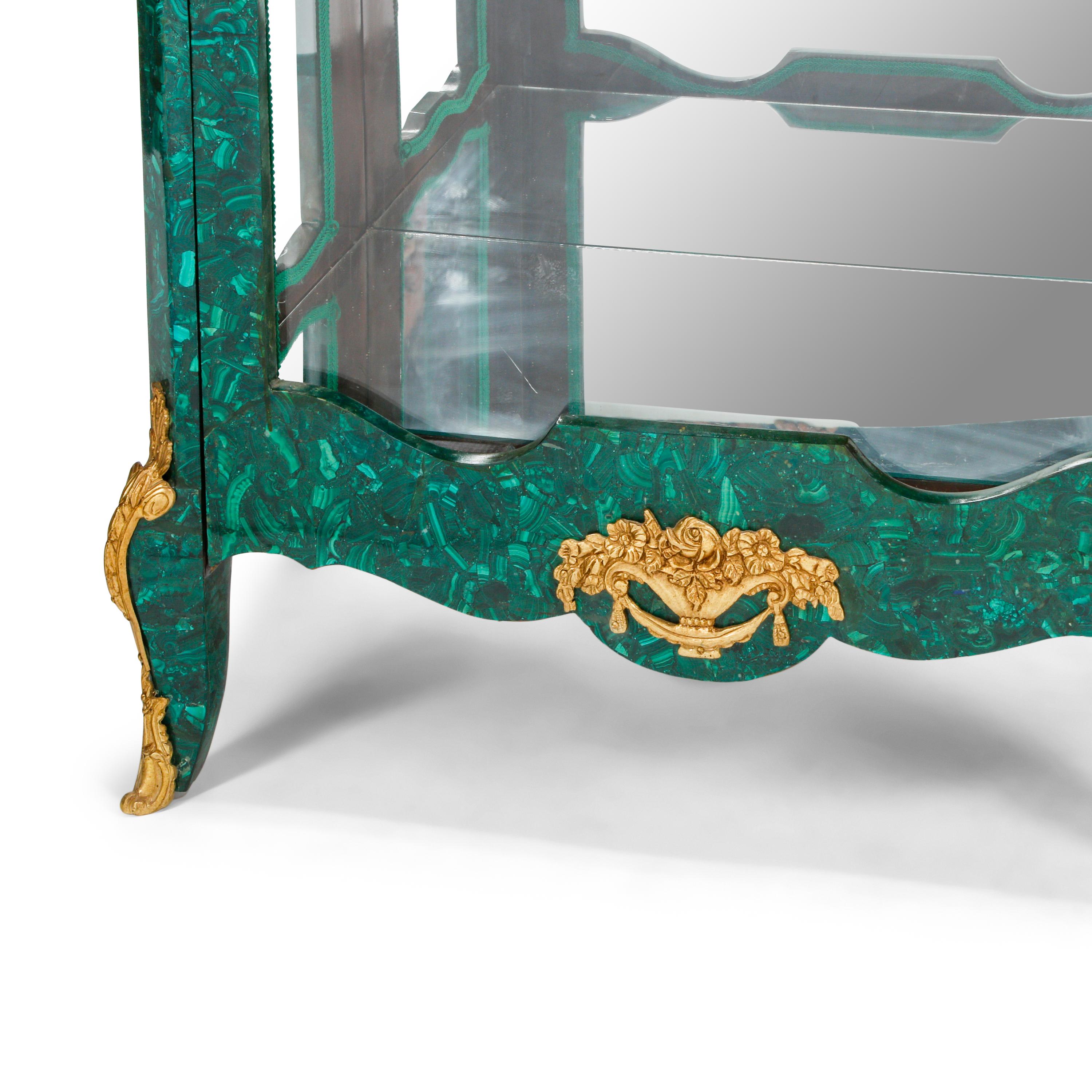 A Pair of Louis XVI Style Malachite Veneered and Gilt Bronze Mounted Vitrine Cabinets