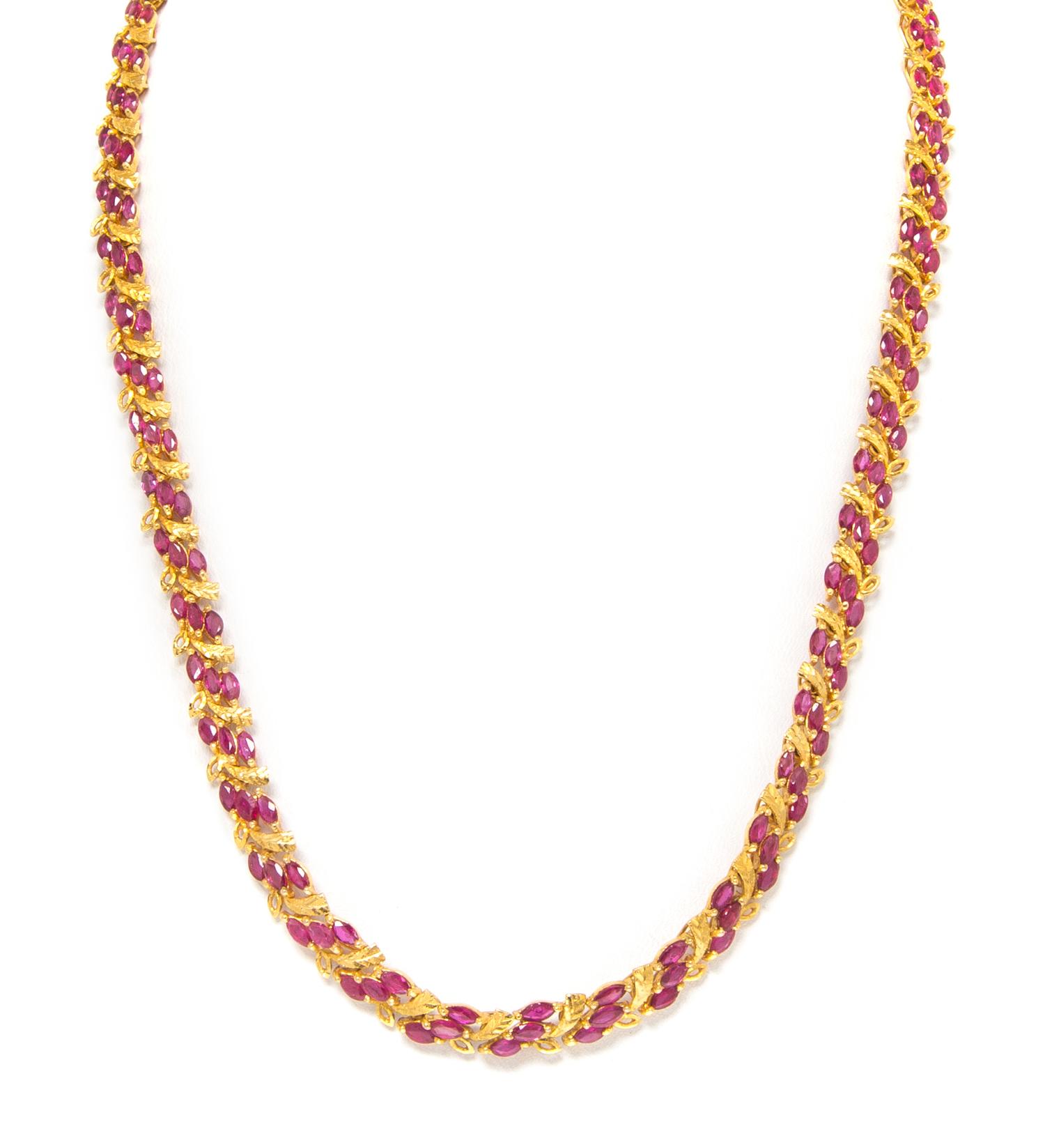 An 18 Karat Yellow Gold and Ruby Necklace, 19.90 dwts.