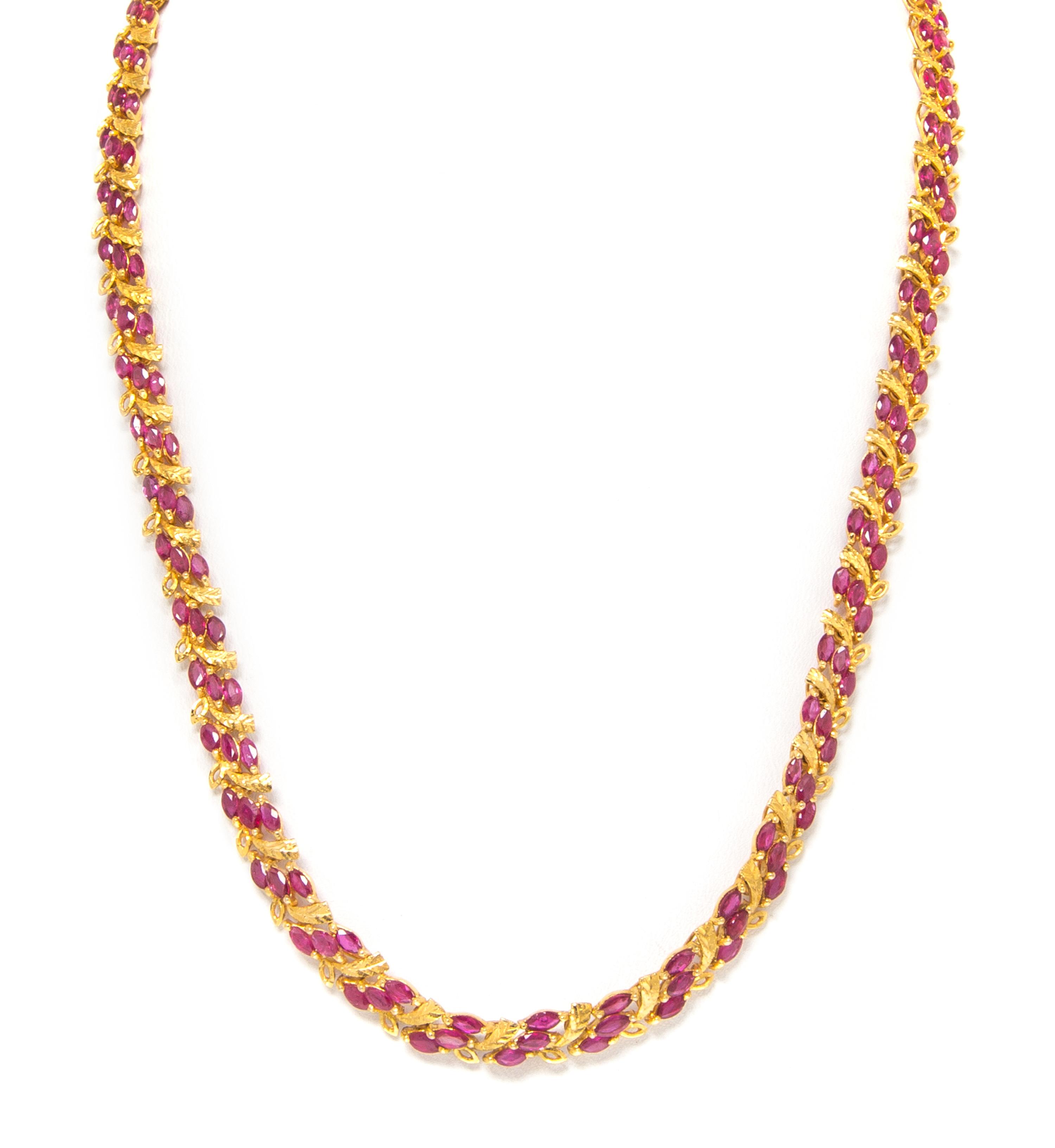 An 18 Karat Yellow Gold and Ruby Necklace, 19.90 dwts.