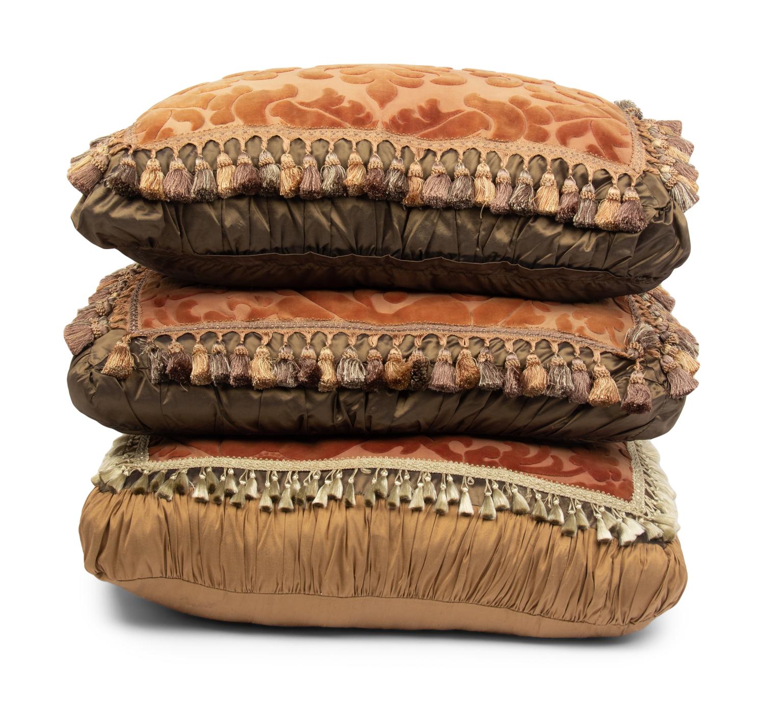 A Set of Three Velvet Upholstered Pillows with Tassels