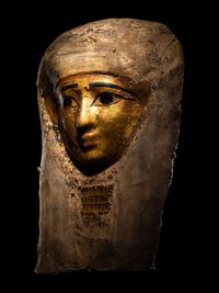 An Egyptian Cartonnage Mummy Mask