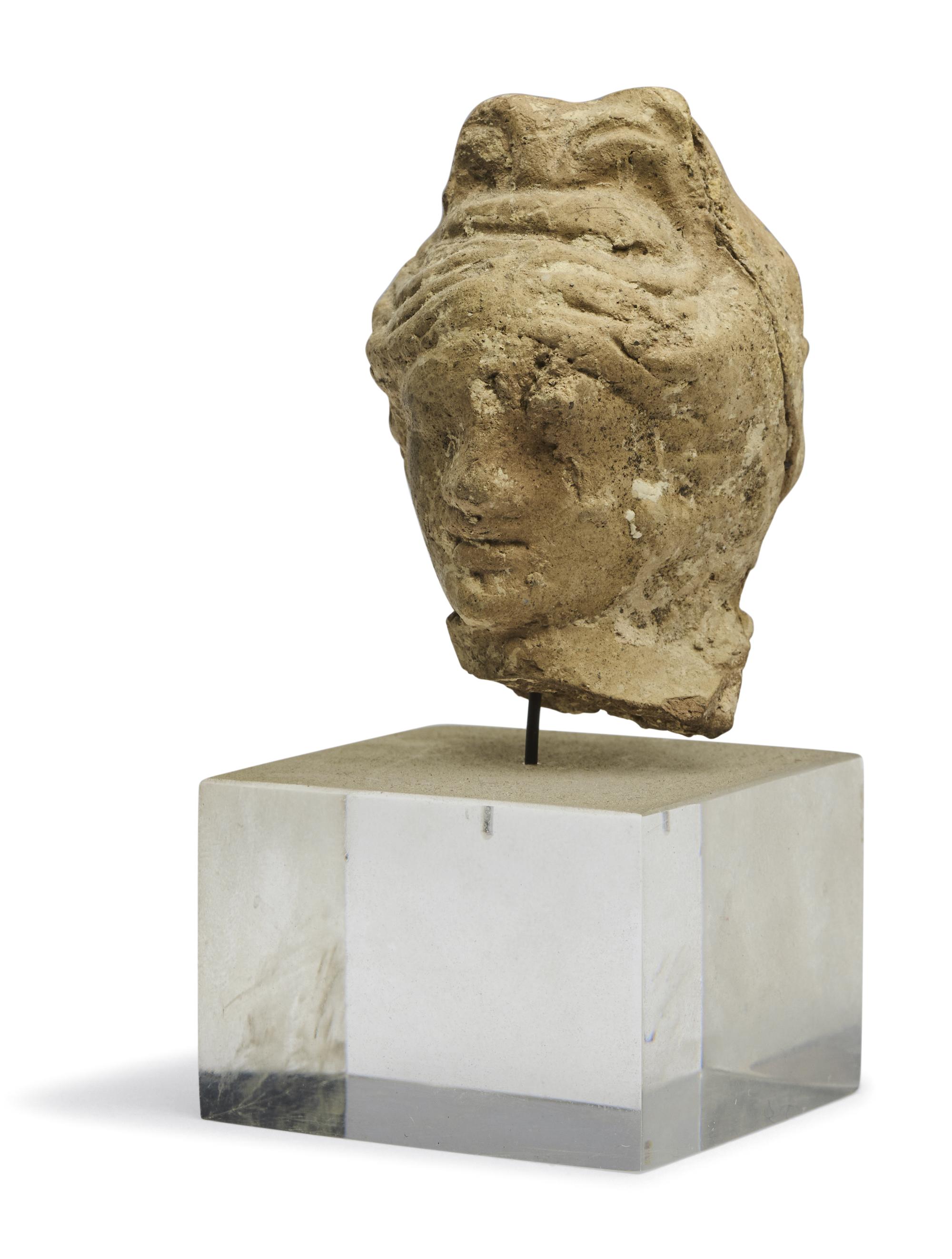 A Greek Terracotta Female Head