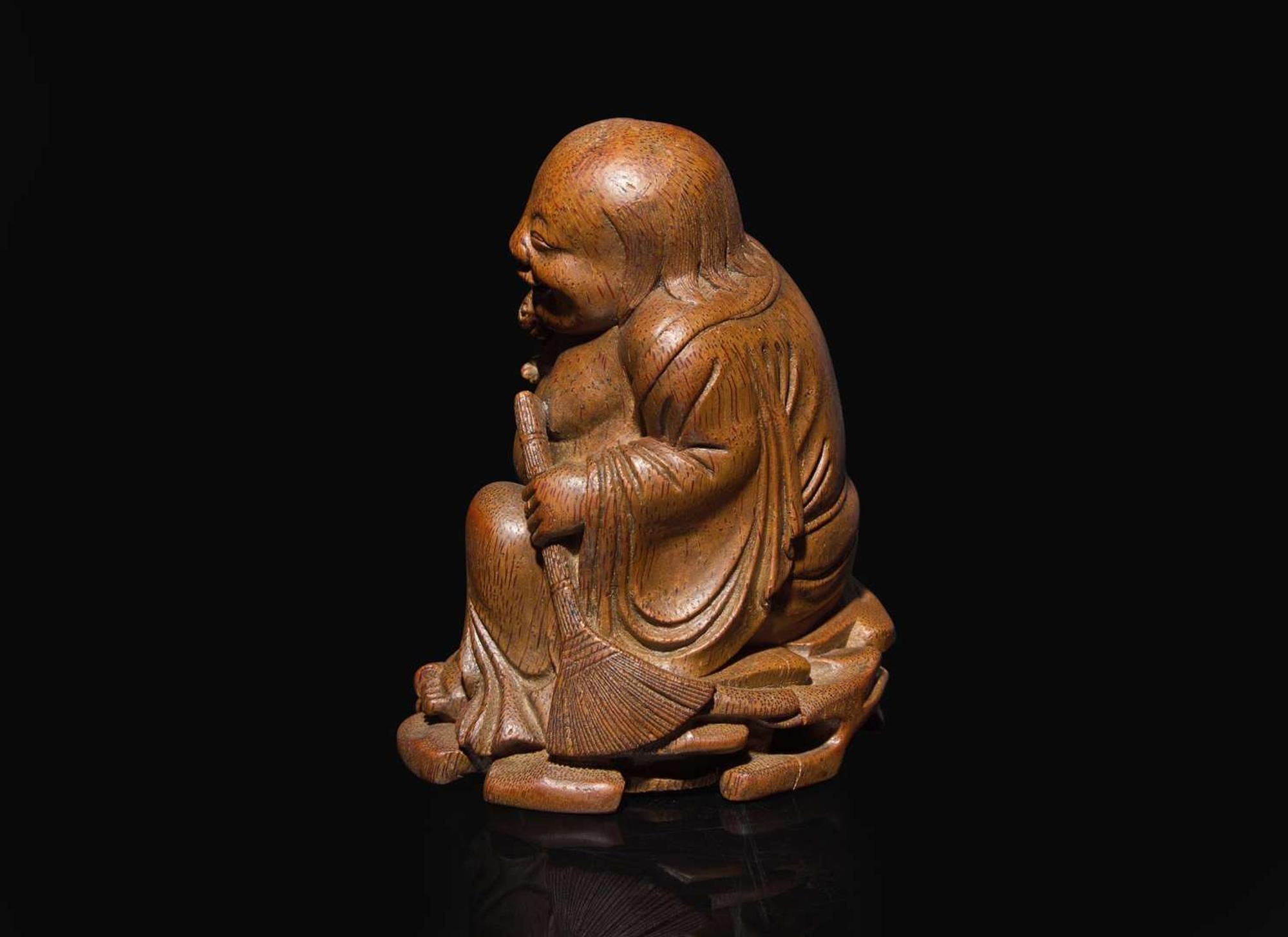 A Chinese carved bamboo figure of the immortal Liu Hai, Qing dynasty, 19th century or earlier 竹雕劉海 清 十九世紀或更早