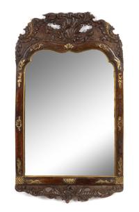 A Rococo Style Parcel Gilt Carved Mirror Height 32 1/4 x width 18 1/2 inches. — 19TH CENTURY