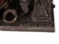 A Mason Cast Iron Mechanical Bank