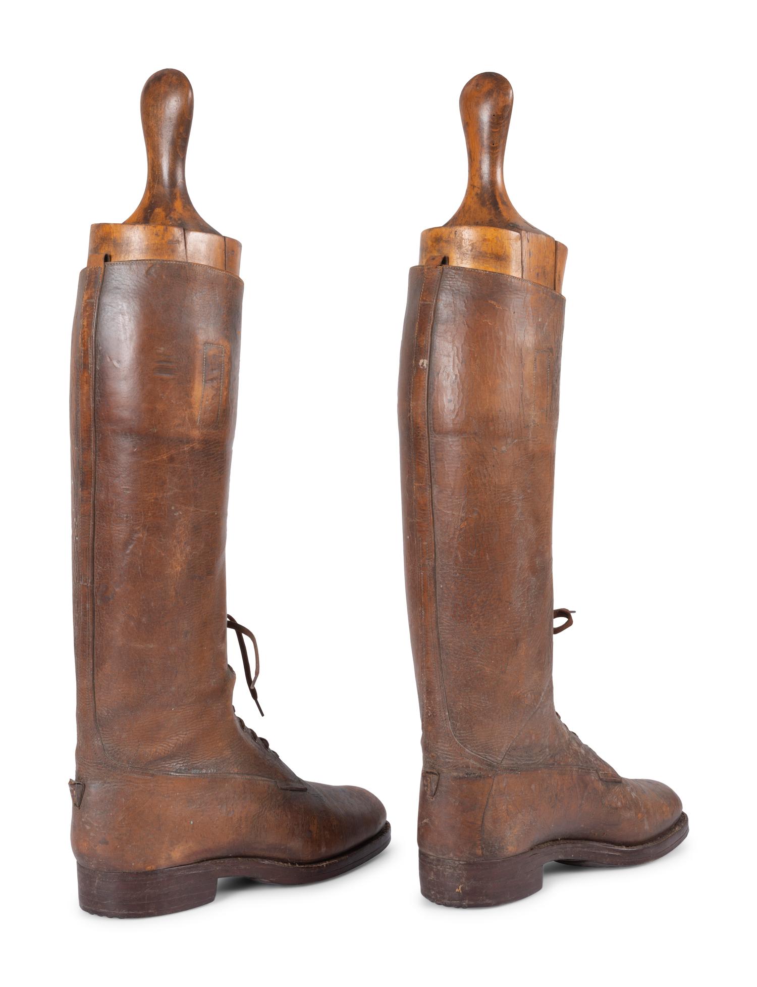 A Pair of Leather Lace Up Pull-On Men's Boots with Wood Boot Stretchers
