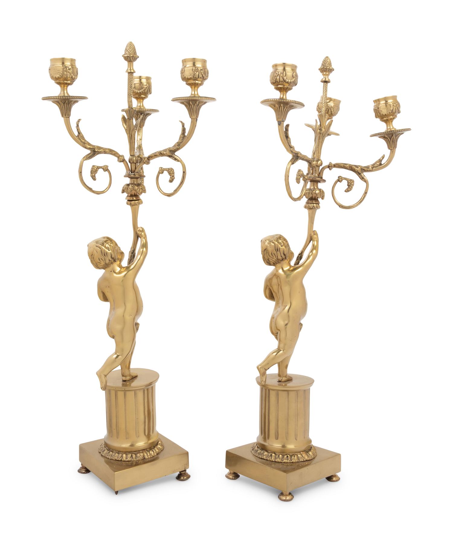 A Pair of Louis XV Style Gilt Metal Three-Light Candelabra