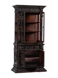 An Italian Renaissance Revival Carved Walnut Bookcase or Vitrine Cabinet