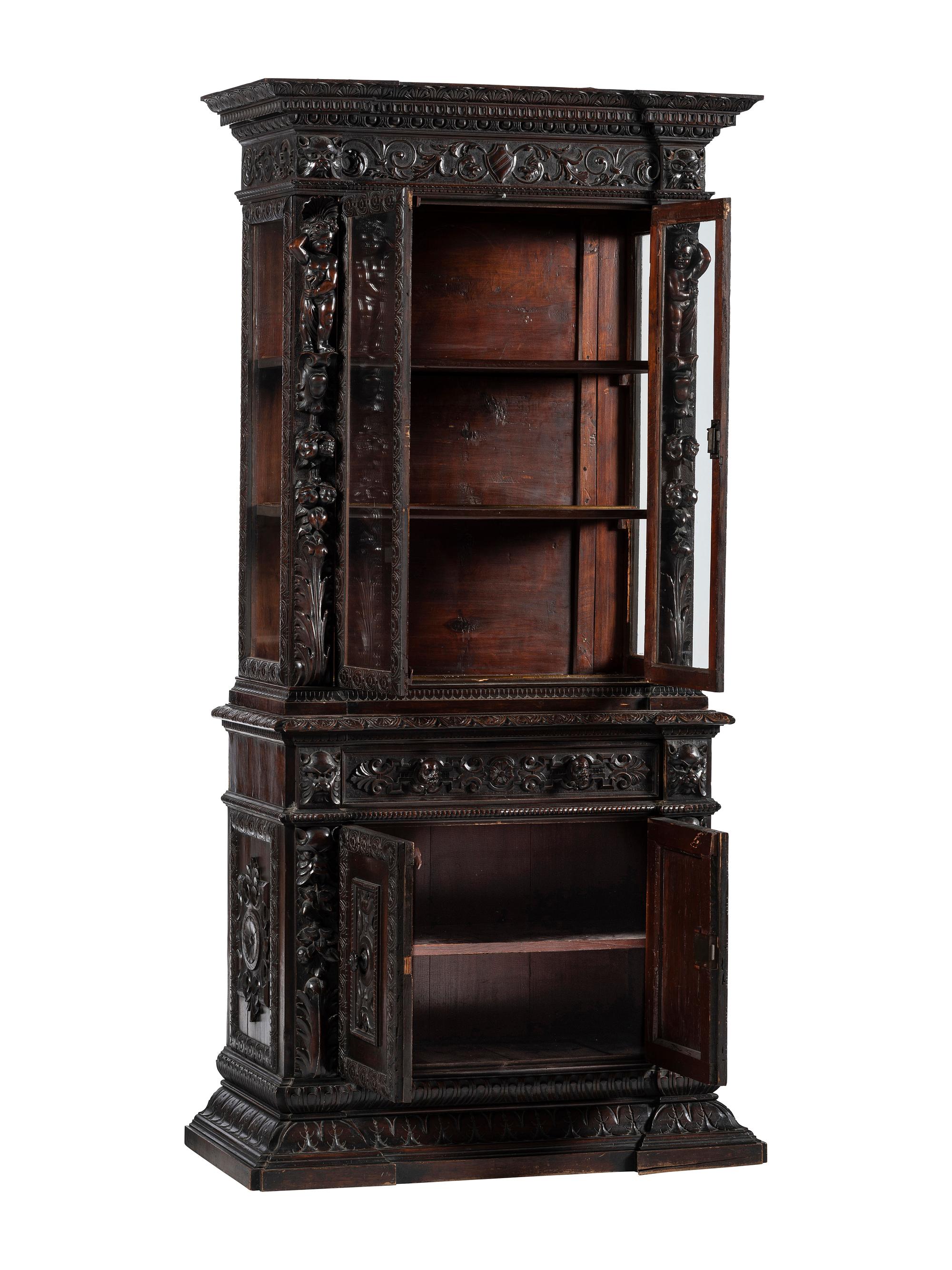 An Italian Renaissance Revival Carved Walnut Bookcase or Vitrine Cabinet