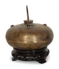 A Chinese Incised Metal Warmer