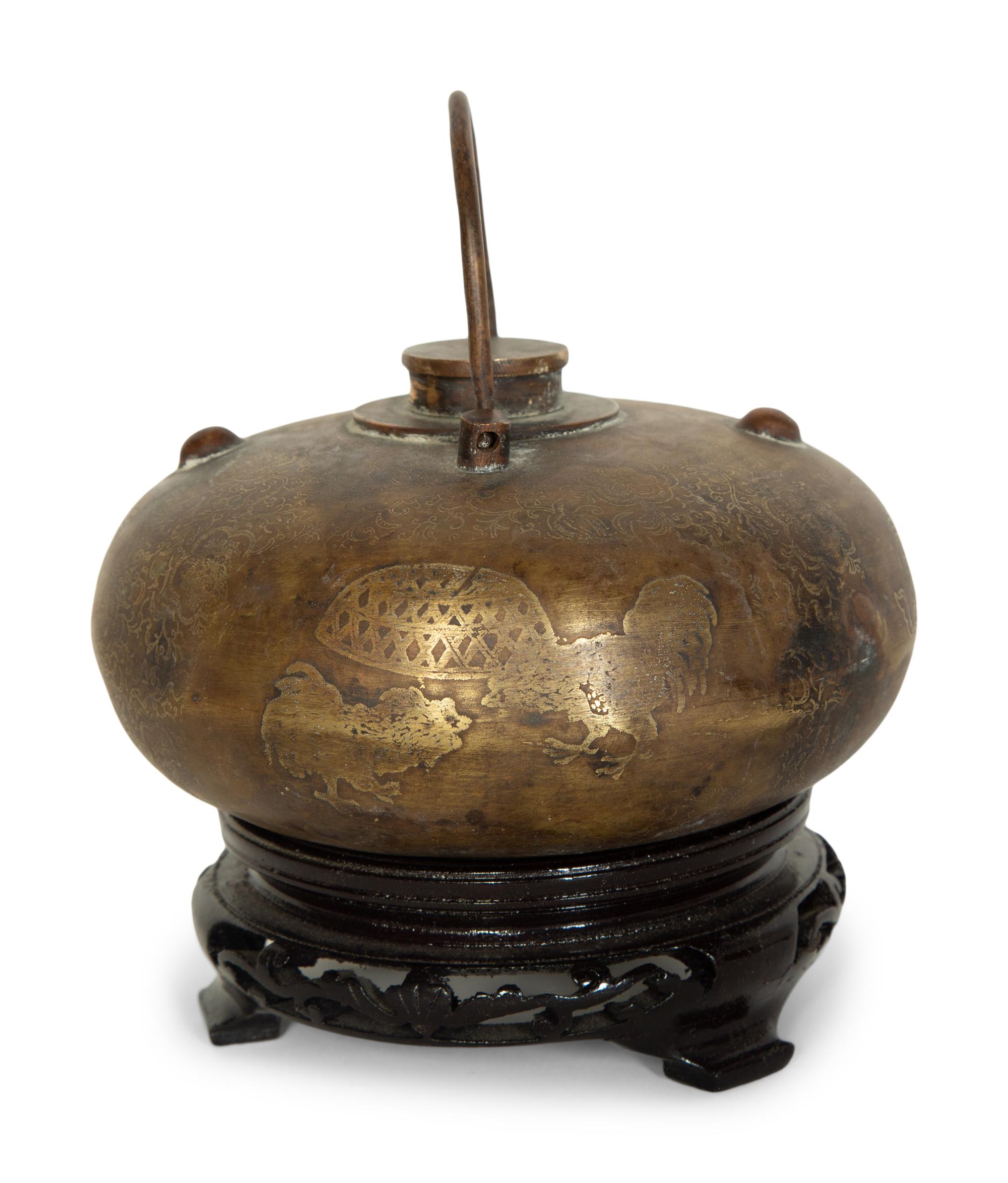 A Chinese Incised Metal Warmer