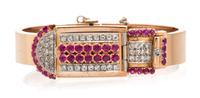 A Retro 14 Karat Rose Gold, Ruby and Diamond Surprise Bangle Bracelet Watch, Seeland, 34.85 dwts.