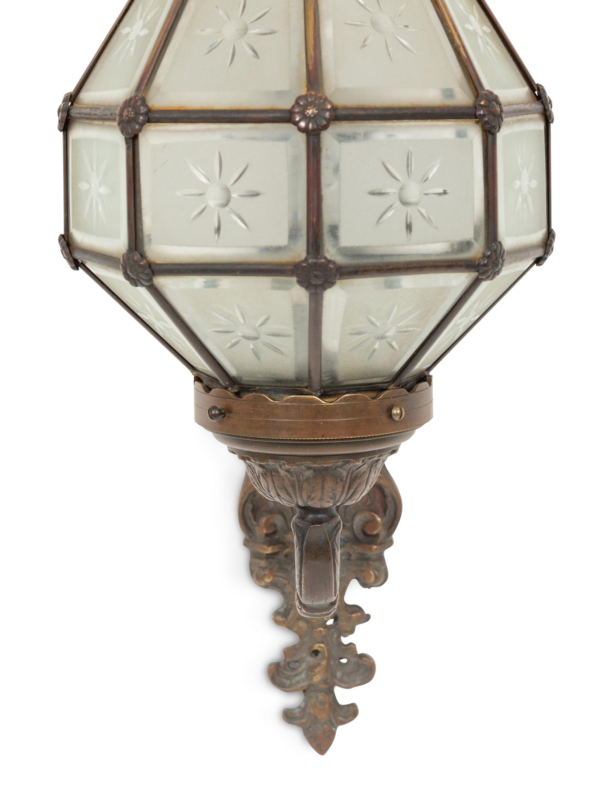 A Bronze and Glass Wall Sconce
