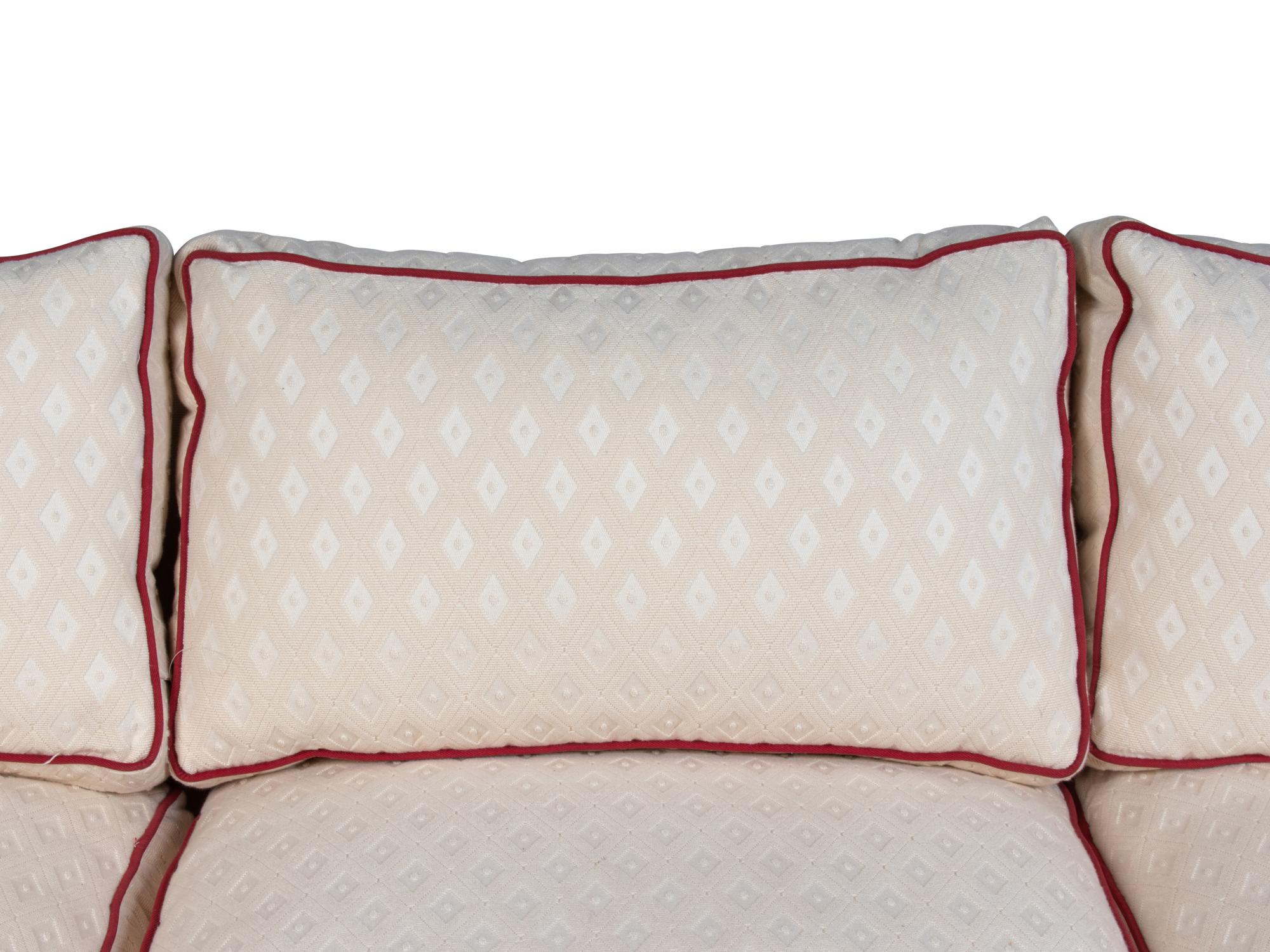 An Upholstered Three-Seat Sofa