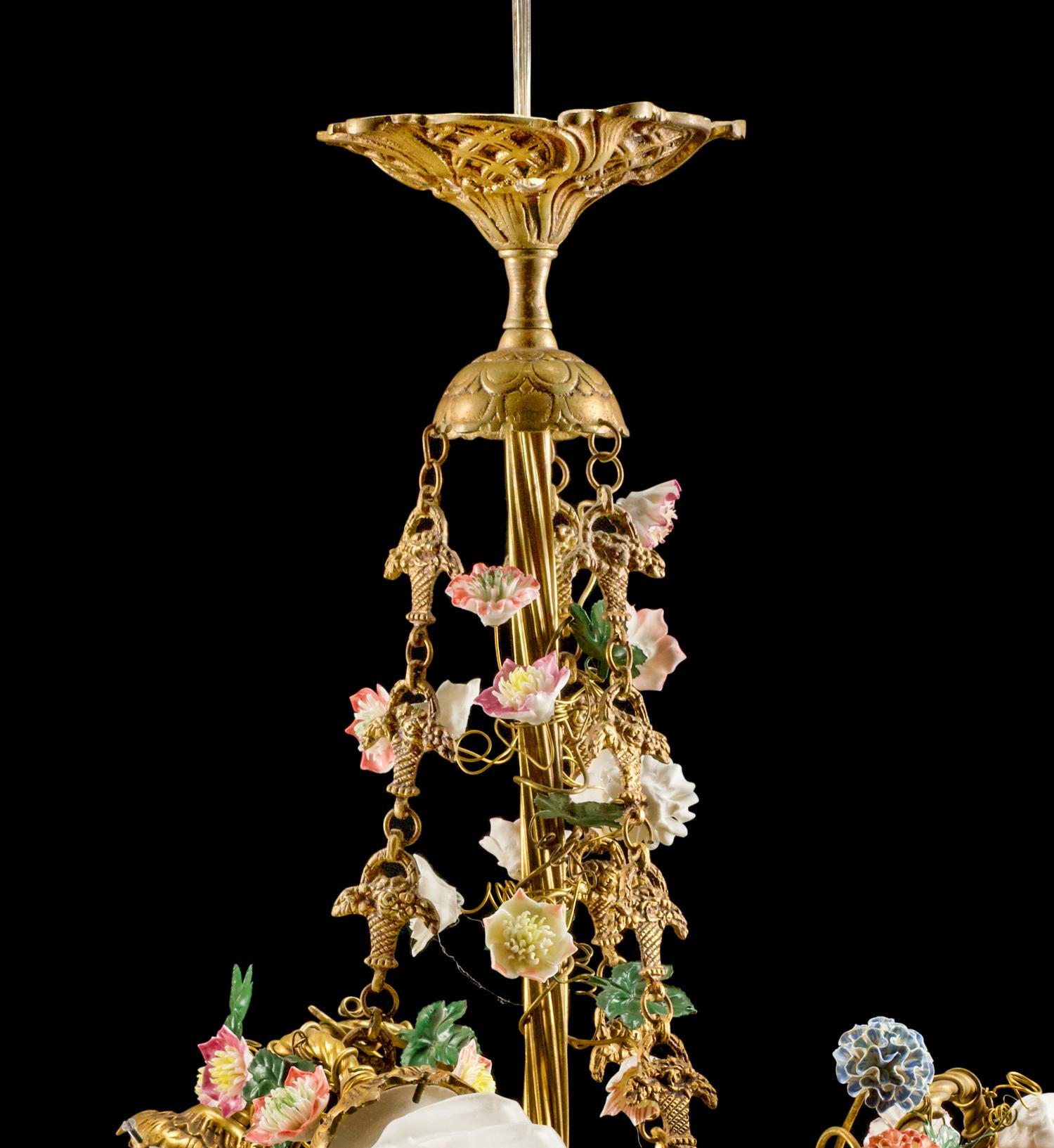 A Pair of Louis XV Style Gilt-Bronze and Porcelain Four-Light Chandeliers