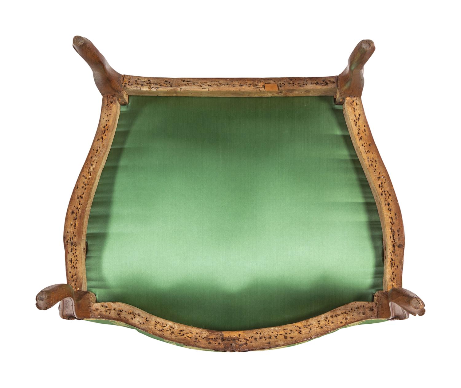 A Pair of Louis XV Beechwood Fauteuils
