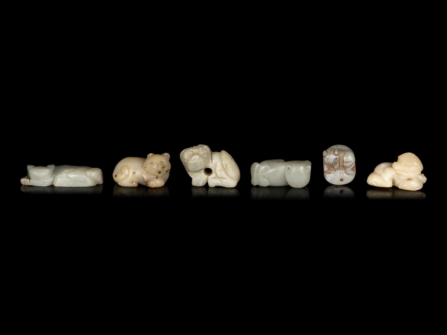 Six Celadon Jade Carvings of Mythical Beasts